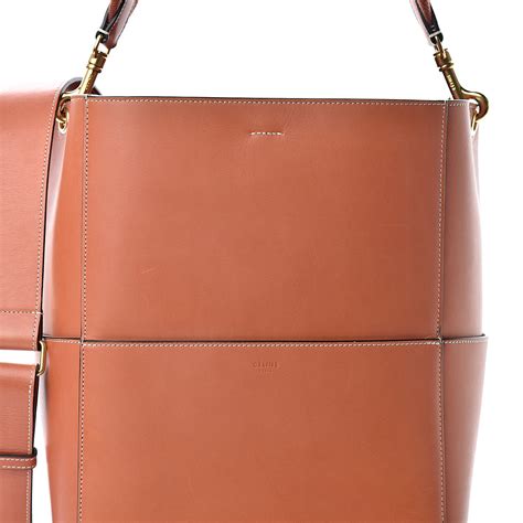 SANGLE BUCKET BAG IN NATURAL CALFSKIN 